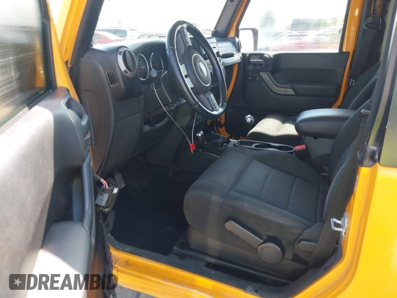 2012 Jeep Wrangler Sport with VIN 1C4AJWAG1CL286332, listed as a IAAI auction lot 42408102 with 169,204 mi miles and . Bid and sale history available at DreamBid. Image 5.
