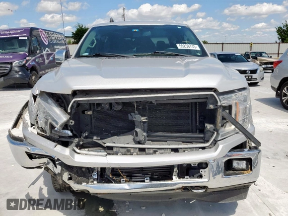 2019 Ford F-150 XL with VIN 1FTEW1E4XKKD25168, listed as a Copart auction lot 61694315 with 113,626 mi miles and Salvage title. Bid and sale history available at DreamBid. Image 5.