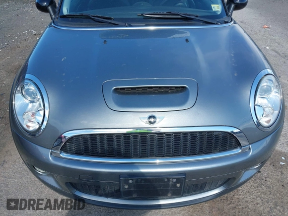 2007 MINI Hardtop S with VIN WMWMF73587TT84728, listed as a IAAI auction lot 41996879 with 145,094 mi miles and . Bid and sale history available at DreamBid. Image 6.