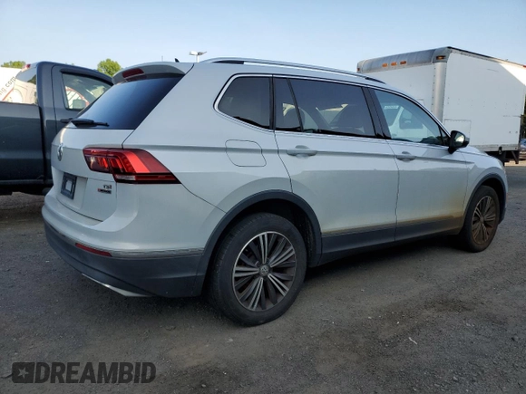 2018 Volkswagen Tiguan SEL z VIN 3VV2B7AXXJM009697, wystawiony jako Copart lot #66335425 z przebiegiem 129 117 mil mil oraz Czysty tytuł • Clean title. Historia ofert i sprzedaży dostępna na DreamBid. Obrazek 3.