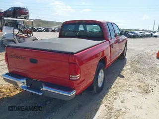 2000 Dodge Dakota Sport with VIN 1B7GL2AX0YS685498, listed as a IAAI auction lot 42069753 with 56,269 mi miles and . Bid and sale history available at DreamBid. Image 4.