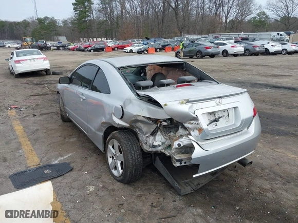2008 Honda Civic Cpe EX-L with VIN 2HGFG12938H546744, listed as a IAAI auction lot 41526059 with 232,981 mi miles. Bid and sale history available at carsss.com. Image 3.