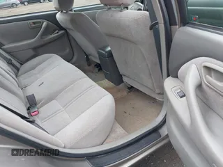 2001 Toyota Camry CE z VIN 4T1BG22K31U097733, wystawiony jako IAAI lot #42276687 z przebiegiem 180 357 mil mil oraz . Historia ofert i sprzedaży dostępna na DreamBid. Obrazek 8.