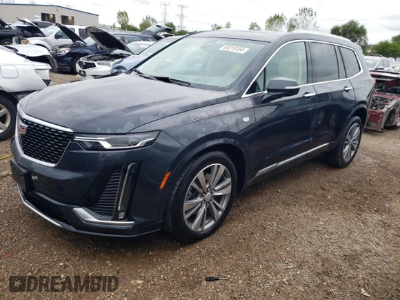 2021 Cadillac XT6 Premium Luxury with VIN 1GYKPDRS0MZ234814, listed as a Copart auction lot 69219154 with 25,493 mi miles and Salvage Title. Bid and sale history available at carsss.com. Image 1.