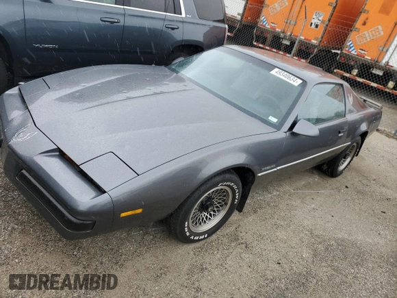 1986 Pontiac Firebird with VIN 1G2FS87S2GL247754, listed as a Copart auction lot 49340634 with 52,081 mi miles and Salvage Title. Bid and sale history available at carsss.com. Image 1.