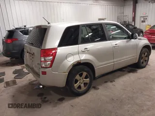2012 Suzuki Grand Vitara Premium z VIN JS3TD0D62C4100440, wystawiony jako IAAI lot #41711815 z przebiegiem 171 527 mil mil oraz . Historia ofert i sprzedaży dostępna na DreamBid. Obrazek 4.