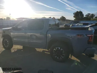 2023 Nissan Frontier PRO-4X with VIN 1N6ED1EK4PN669702, listed as a Copart auction lot 41687475 with 8,855 mi miles and Salvage Title. Bid and sale history available at carsss.com. Image 2.