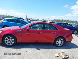 2009 Cadillac CTS RWD w/1SA with VIN 1G6DF577290142964, listed as a IAAI auction lot 42017475 with 171,696 mi miles. Bid and sale history available at carsss.com. Image 14.