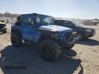 2011 Jeep Wrangler Rubicon with VIN 1J4BA6D15BL563410, listed as a Copart auction lot 76973964 with 68,334 mi miles and Salvage title. Bid and sale history available at DreamBid. Image 4.