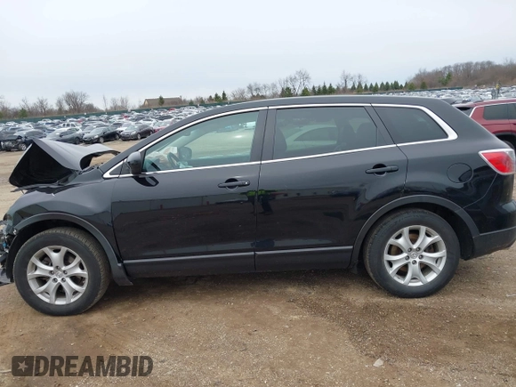 2012 Mazda CX-9 Touring with VIN JM3TB3CA7C0349505, listed as a IAAI auction lot 41971472 with 219,716 mi miles and . Bid and sale history available at DreamBid. Image 14.