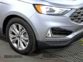 2020 Ford Edge Titanium with VIN 2FMPK3K95LBA30678, listed as a IAAI auction lot 42714178 with 60,935 mi miles and . Bid and sale history available at DreamBid. Image 16.