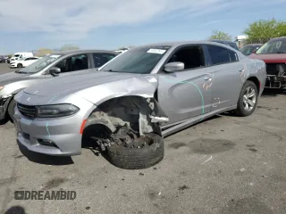 2015 Dodge Charger SXT z VIN 2C3CDXHG7FH865746, wystawiony jako Copart lot #53802265 z przebiegiem 103 687 mil mil oraz Szkody całkowita. Historia ofert i sprzedaży dostępna na DreamBid. Obrazek 1.