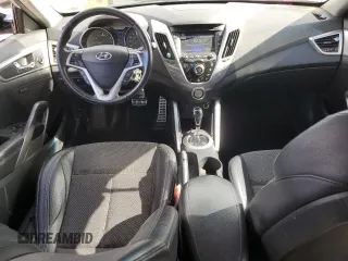 2013 Hyundai Veloster w/Black Int z VIN KMHTC6AD6DU121277, wystawiony jako Copart lot #53222805 z przebiegiem 155 236 mil mil oraz Czysty tytuł • Clean title. Historia ofert i sprzedaży dostępna na DreamBid. Obrazek 8.