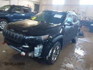 2019 Jeep Cherokee Trailhawk Elite with VIN 1C4PJMBX5KD278921, listed as a IAAI auction lot 41843126 with 139,431 mi miles. Bid and sale history available at carsss.com. Image 2.