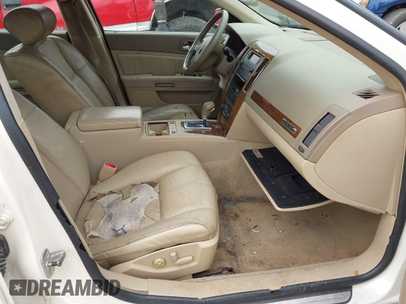 2005 Cadillac STS z VIN 1G6DW677250198015, wystawiony jako IAAI lot #41543304 z przebiegiem 160 000 mil mil oraz . Historia ofert i sprzedaży dostępna na DreamBid. Obrazek 5.