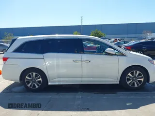 2015 Honda Odyssey Touring Elite with VIN 5FNRL5H91FB038099, listed as a IAAI auction lot 41829649 with 167,017 mi miles and . Bid and sale history available at DreamBid. Image 13.