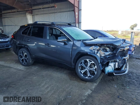 2021 Toyota RAV4 Prime XSE with VIN JTMEB3FV9MD071684, listed as a Copart auction lot 43974185 with 0 mi miles and Salvage Title. Bid and sale history available at carsss.com. Image 4.