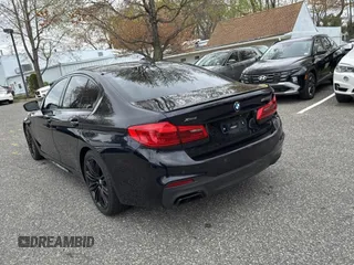 2018 BMW 5 Series M550i xDrive with VIN WBAJB9C57JB035521, listed as a Copart auction lot 54177125 with 63,924 mi miles and Clean Title. Bid and sale history available at carsss.com. Image 3.
