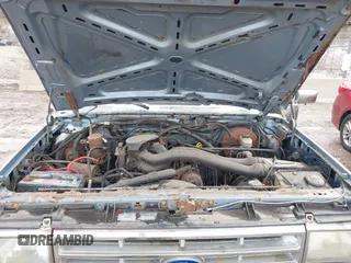 1987 Ford Bronco XL with VIN 1FMEU15N4HLA38776, listed as a IAAI auction lot 41767617 with 52,914 mi miles. Bid and sale history available at carsss.com. Image 10.