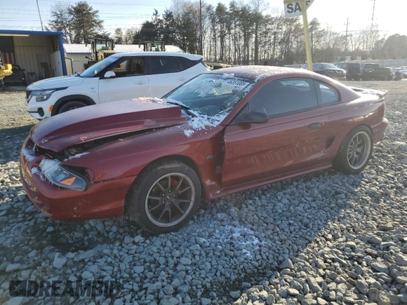 1996 Ford Mustang GT z VIN 1FALP42X0TF168223, wystawiony jako Copart lot #46351085 z przebiegiem 121 657 mil mil oraz Szkoda całkowita • Salvage title. Historia ofert i sprzedaży dostępna na DreamBid. Obrazek 1.
