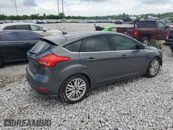 2017 Ford Focus Titanium z VIN 1FADP3N22HL307260, wystawiony jako Copart lot #61399785 z przebiegiem 103 293 mil mil oraz Szkoda całkowita • Salvage title. Historia ofert i sprzedaży dostępna na DreamBid. Obrazek 3.