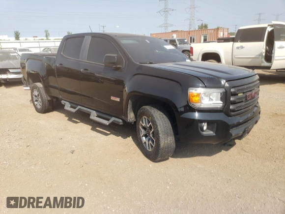2015 GMC Canyon 4WD SLE with VIN 1GTG6BE31F1121425, listed as a Copart auction lot 67322994 with 112,435 mi miles and Salvage Title. Bid and sale history available at carsss.com. Image 4.
