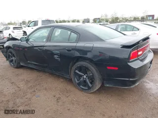 2013 Dodge Charger SXT Plus with VIN 2C3CDXHG1DH620101, listed as a IAAI auction lot 41755409 with 186,939 mi miles. Bid and sale history available at carsss.com. Image 3.