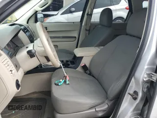 2009 Ford Escape XLS z VIN 1FMCU92789KB10338, wystawiony jako Copart lot #57452495 z przebiegiem 285 171 mil mil oraz Szkoda całkowita • Salvage title. Historia ofert i sprzedaży dostępna na DreamBid. Obrazek 7.