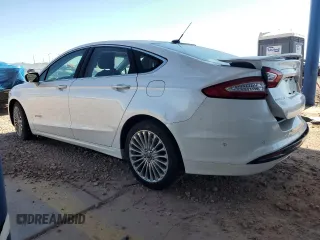 2013 Ford Fusion Titanium Hybrid z VIN 3FA6P0RUXDR376633, wystawiony jako Copart lot #57685555 z przebiegiem 133 248 mil mil oraz Szkoda całkowita • Salvage title. Historia ofert i sprzedaży dostępna na DreamBid. Obrazek 2.