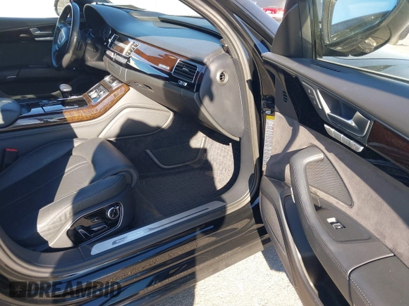2017 Audi A8 with VIN WAU44AFD0HN017821, listed as a IAAI auction lot 41676097 with 107,378 mi miles and . Bid and sale history available at DreamBid. Image 5.
