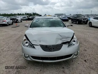 2006 Toyota Solara SE z VIN 4T1CE38P26U752491, wystawiony jako Copart lot #54844985 z przebiegiem 68 956 mil mil oraz Szkoda całkowita • Salvage title. Historia ofert i sprzedaży dostępna na DreamBid. Obrazek 13.