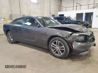 2019 Dodge Charger SXT with VIN 2C3CDXJG4KH520470, listed as a Copart auction lot 51947755 with 90,876 mi miles and Salvage Title. Bid and sale history available at DreamBid. Image 4.