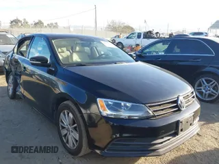 2015 Volkswagen Jetta Sedan 1.8T SE with VIN 3VWD17AJ3FM407697, listed as a IAAI auction lot 40659086 with 107,834 mi miles. Bid and sale history available at carsss.com. Image 1.