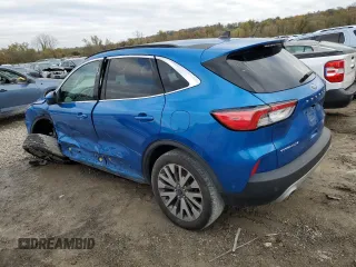2021 Ford Escape Titanium Hybrid z VIN 1FMCU9DZ2MUA52982, wystawiony jako Copart lot #79444904 z przebiegiem 104 578 mil mil oraz Czysty tytuł • Clean title. Historia ofert i sprzedaży dostępna na DreamBid. Obrazek 2.