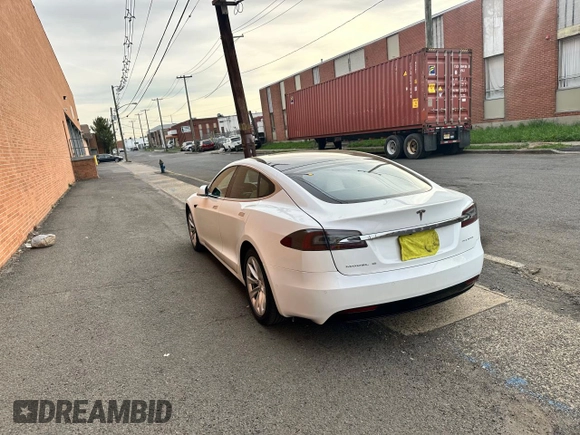 2019 Tesla Model S 75D with VIN 5YJSA1E28KF333962, listed as a Copart auction lot 54815975 with 21,203 mi miles and Salvage title. Bid and sale history available at DreamBid. Image 3.