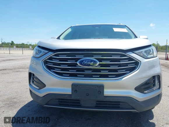 2019 Ford Edge SEL with VIN 2FMPK3J94KBB67207, listed as a IAAI auction lot 42758134 with 154,823 mi miles and . Bid and sale history available at DreamBid. Image 6.