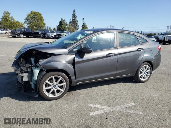 2019 Ford Fiesta SE z VIN 3FADP4BJ4KM106189, wystawiony jako Copart lot #57913315 z przebiegiem Nie podano mil oraz Szkoda całkowita • Salvage title. Historia ofert i sprzedaży dostępna na DreamBid. Obrazek 1.
