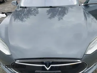 2013 Tesla Model S with VIN 5YJSA1CN8DFP21869, listed as a IAAI auction lot 41772603 with Not provided miles and . Bid and sale history available at DreamBid. Image 10.