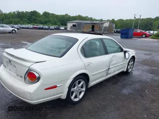 2002 Nissan Maxima GLE with VIN JN1DA31A62T311847, listed as a IAAI auction lot 42351053 with 195,713 mi miles and . Bid and sale history available at DreamBid. Image 4.
