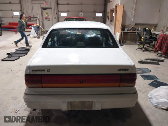1994 Dodge Spirit z VIN 3B3AA46KXRT214299, wystawiony jako IAAI lot #41908262 z przebiegiem 72 619 mil mil oraz . Historia ofert i sprzedaży dostępna na DreamBid. Obrazek 16.