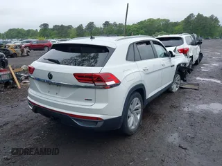 2021 Volkswagen Atlas SE z VIN 1V2KE2CAXMC202664, wystawiony jako IAAI lot #42292276 z przebiegiem 57 760 mil mil oraz . Historia ofert i sprzedaży dostępna na DreamBid. Obrazek 4.