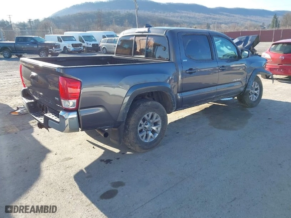 2017 Toyota Tacoma SR5 with VIN 5TFCZ5AN0HX063077, listed as a IAAI auction lot 41887043 with 142,015 mi miles. Bid and sale history available at carsss.com. Image 4.
