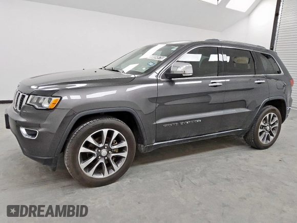 2018 Jeep Grand Cherokee Limited z VIN 1C4RJEBG3JC340061, wystawiony jako Copart lot #56654975 z przebiegiem 151 443 mil mil oraz Czysty tytuł • Clean title. Historia ofert i sprzedaży dostępna na DreamBid. Obrazek 1.
