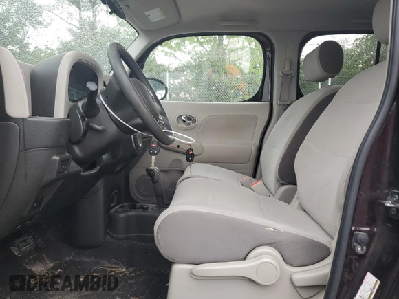 2009 Nissan Cube S z VIN JN8AZ28R39T105396, wystawiony jako Copart lot #57292795 z przebiegiem 94 536 mil mil oraz Tytuł czysty. Historia ofert i sprzedaży dostępna na DreamBid. Obrazek 7.