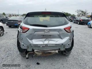 2016 Mazda CX-5 Sport with VIN JM3KE4BY1G0799275, listed as a Copart auction lot 51202355 with 98,409 mi miles and Non Repairable. Bid and sale history available at carsss.com. Image 6.