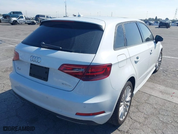 2016 Audi A3 e-tron Premium with VIN WAUUPBFF2GA118685, listed as a IAAI auction lot 41841960 with 82,192 mi miles. Bid and sale history available at carsss.com. Image 4.