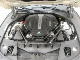 2015 BMW 7 Series 750Li with VIN WBAYE8C50FD781160, listed as a IAAI auction lot 41061232 with 154,496 mi miles. Bid and sale history available at carsss.com. Image 10.