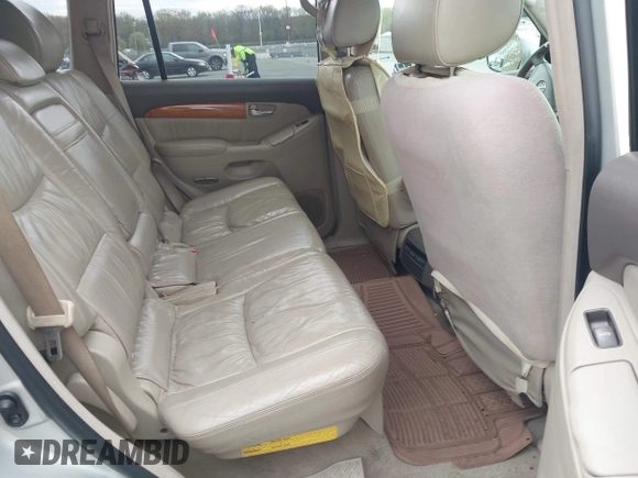 2004 Lexus GX with VIN JTJBT20X240063922, listed as a IAAI auction lot 42087170 with 251,366 mi miles. Bid and sale history available at carsss.com. Image 8.