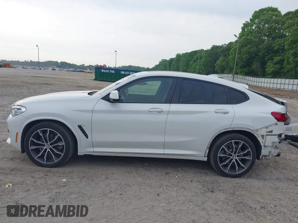 2019 BMW X4 xDrive30i with VIN 5UXUJ3C52KLG54945, listed as a IAAI auction lot 42083434 with 153,956 mi miles and . Bid and sale history available at DreamBid. Image 15.