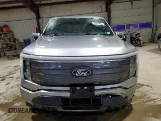 2024 Ford F-150 Lightning Lariat z VIN 1FT6W5L74RWG04451, wystawiony jako Copart lot #86058664 z przebiegiem 2 232 mil mil oraz Szkoda całkowita • Salvage title. Historia ofert i sprzedaży dostępna na DreamBid. Obrazek 5.